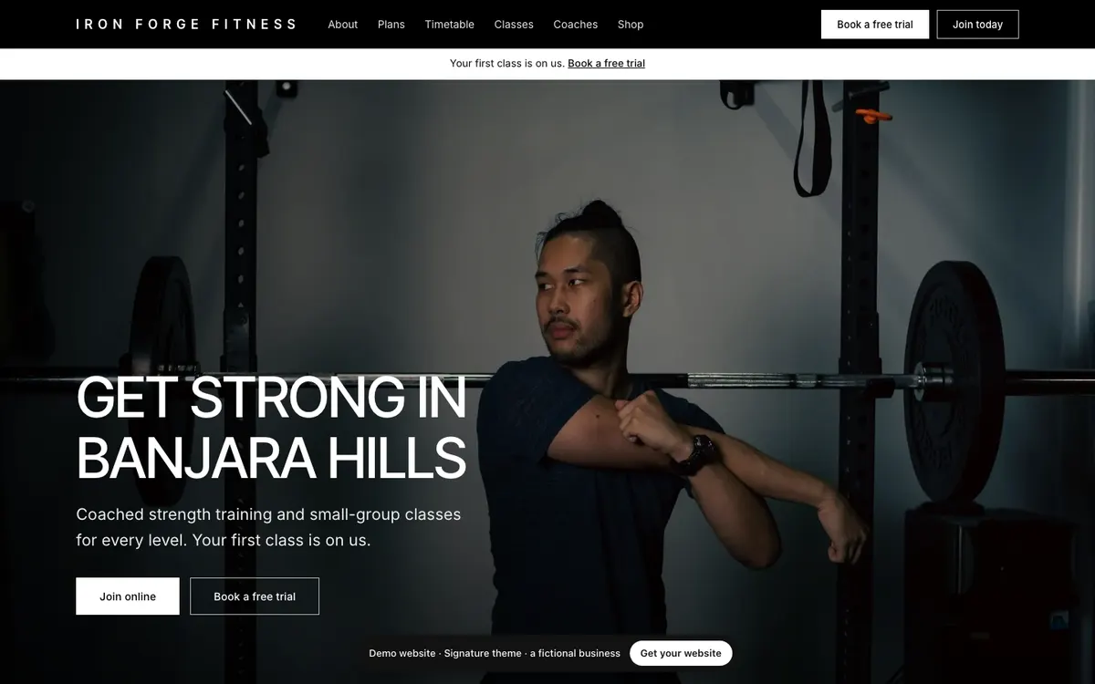 The Signature theme on a computer: the demo website of Iron Forge Fitness, a fictional gym
